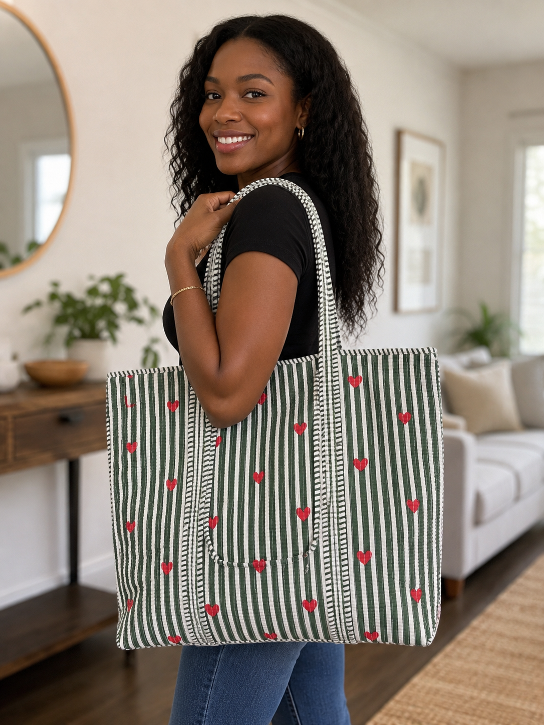 Model carrying a green heart-print quilted tote
